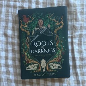 Road of bones series romantasy book Roots of darkness by Demi winters hardcover